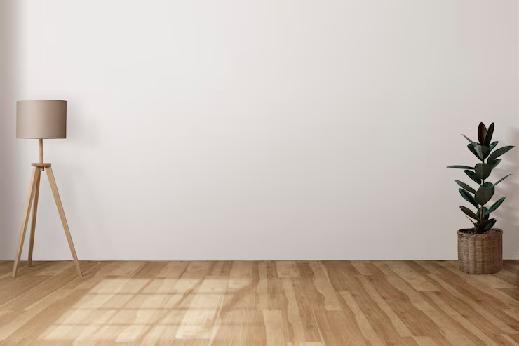 Na imagem, escritório com pisos de madeira